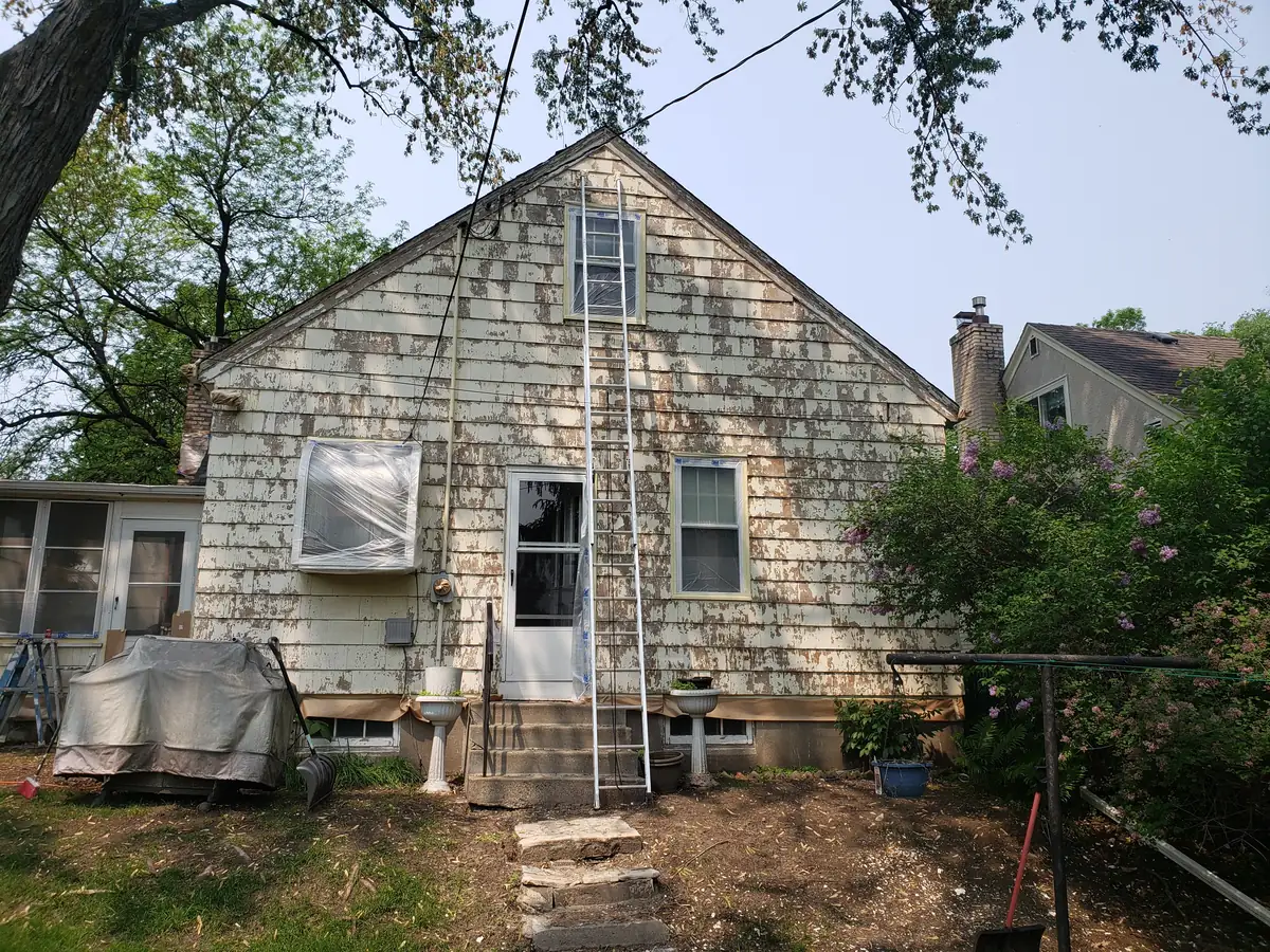 Rear before: Exterior repaint (cedar shake and siding) · Minneapolis.