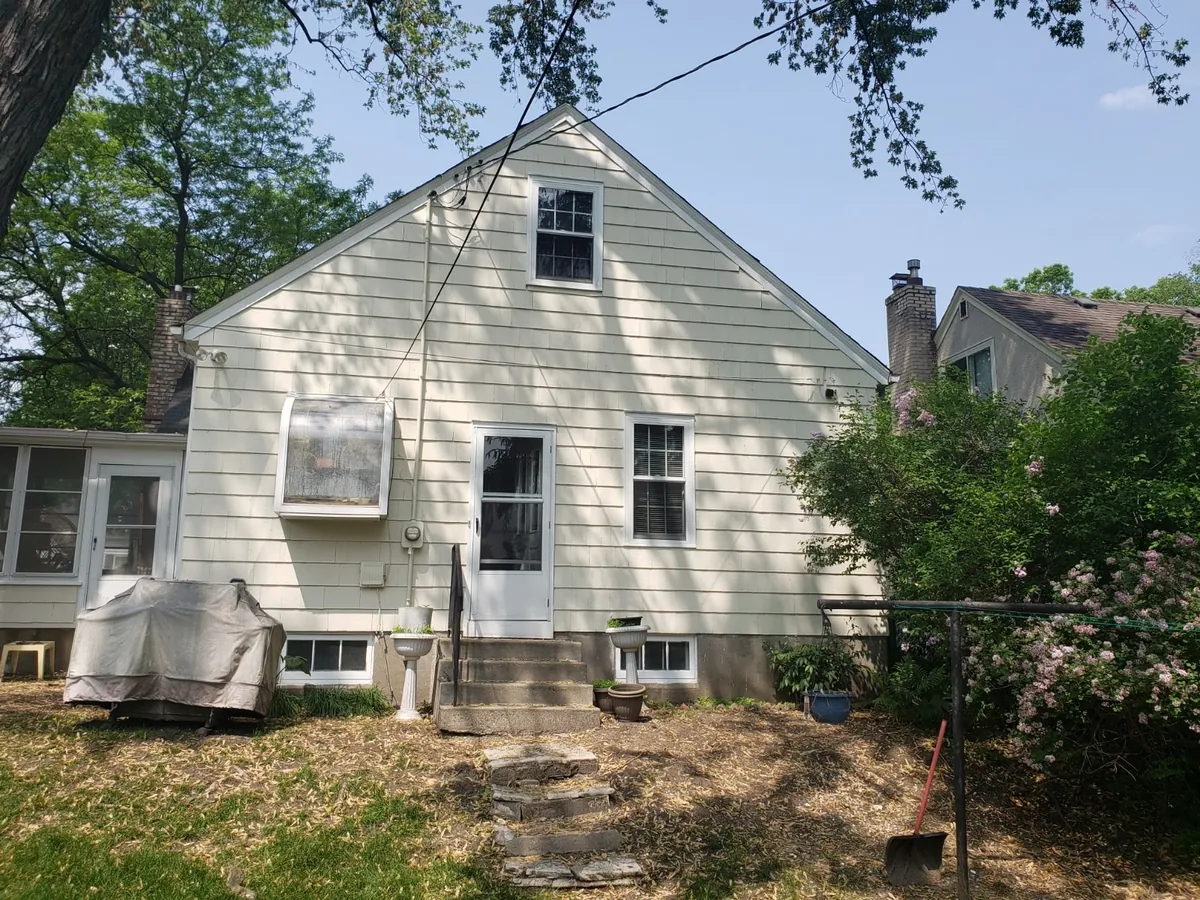 Rear after: Exterior repaint (cedar shake and siding) · Minneapolis.