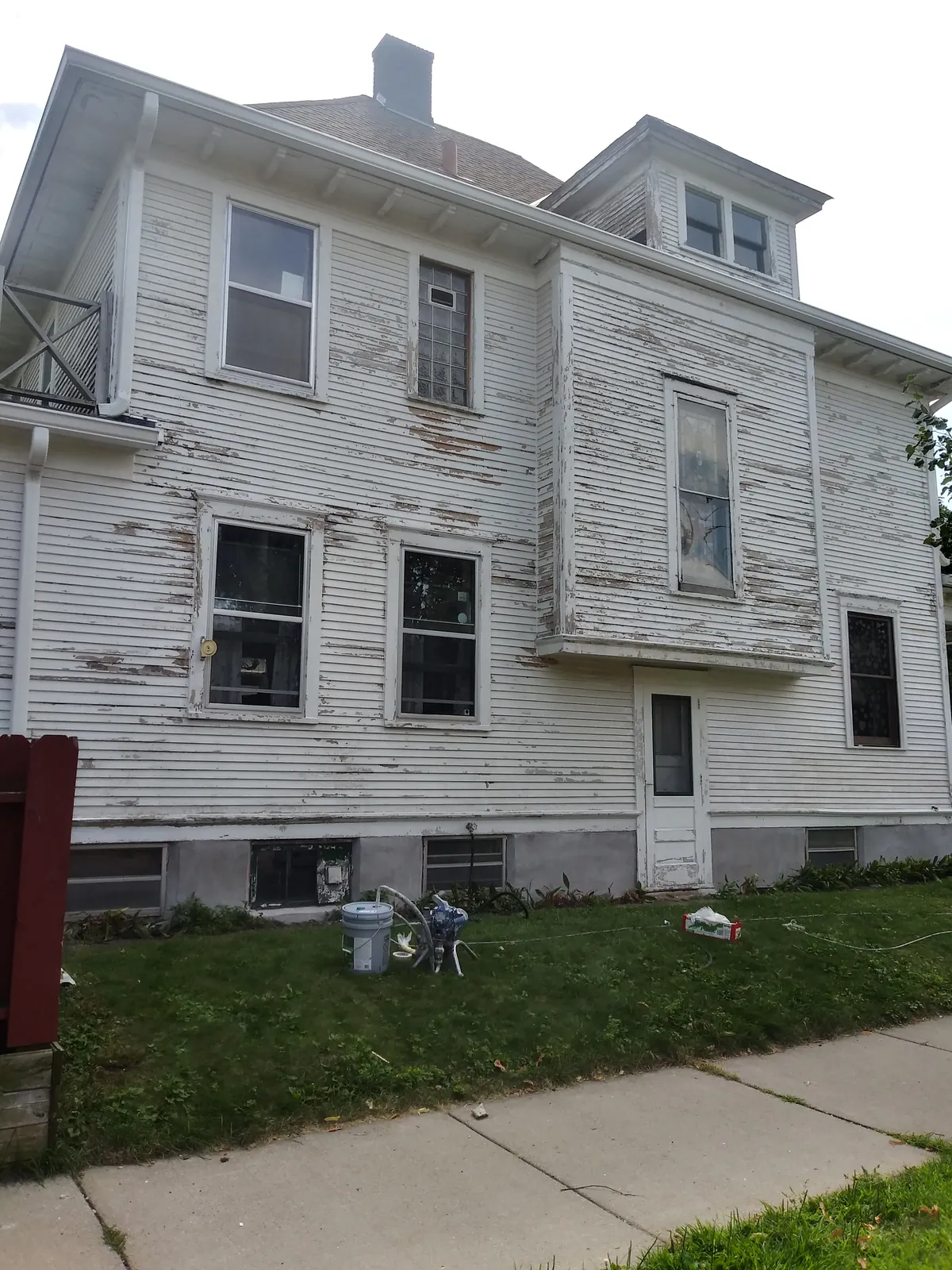 Side before: Exterior repaint (teal foursquare) · Minneapolis.