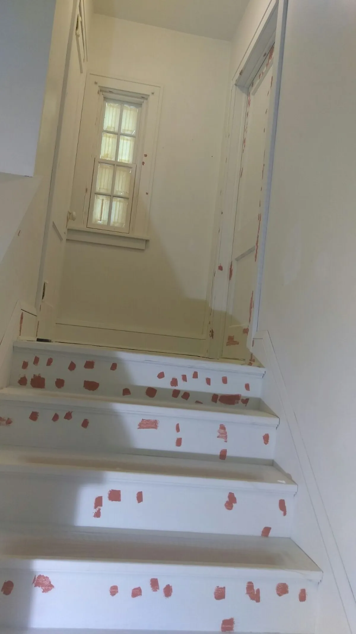 Stair trim masked and prepared: Trim enameling · Minneapolis.