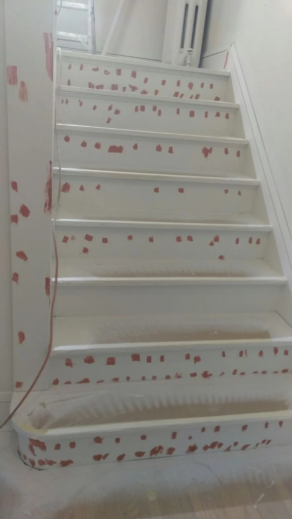 Stair risers masked before enameling: Trim enameling · Minneapolis.
