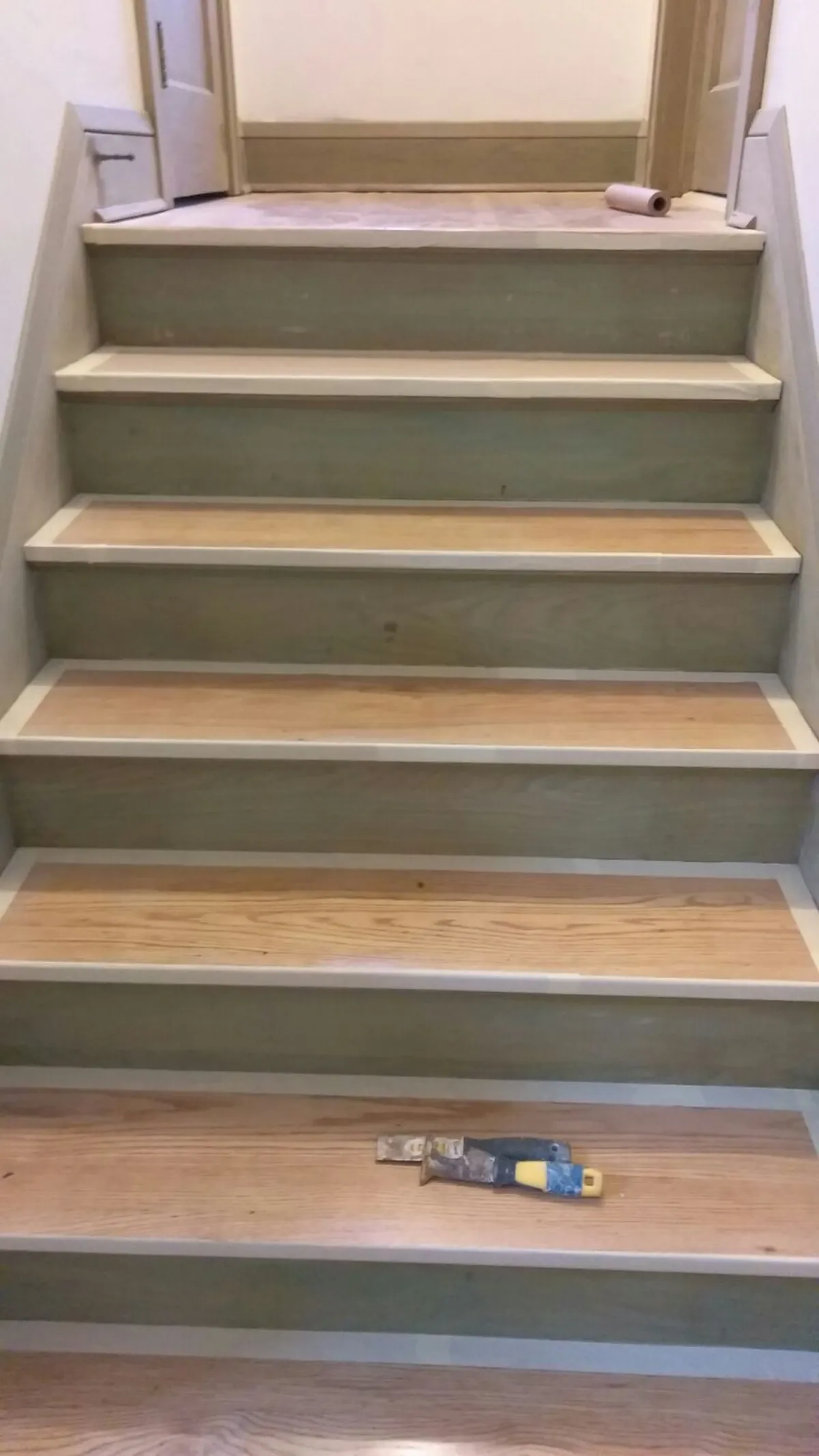 Stair tread protection and riser preparation: Trim enameling · Minneapolis.