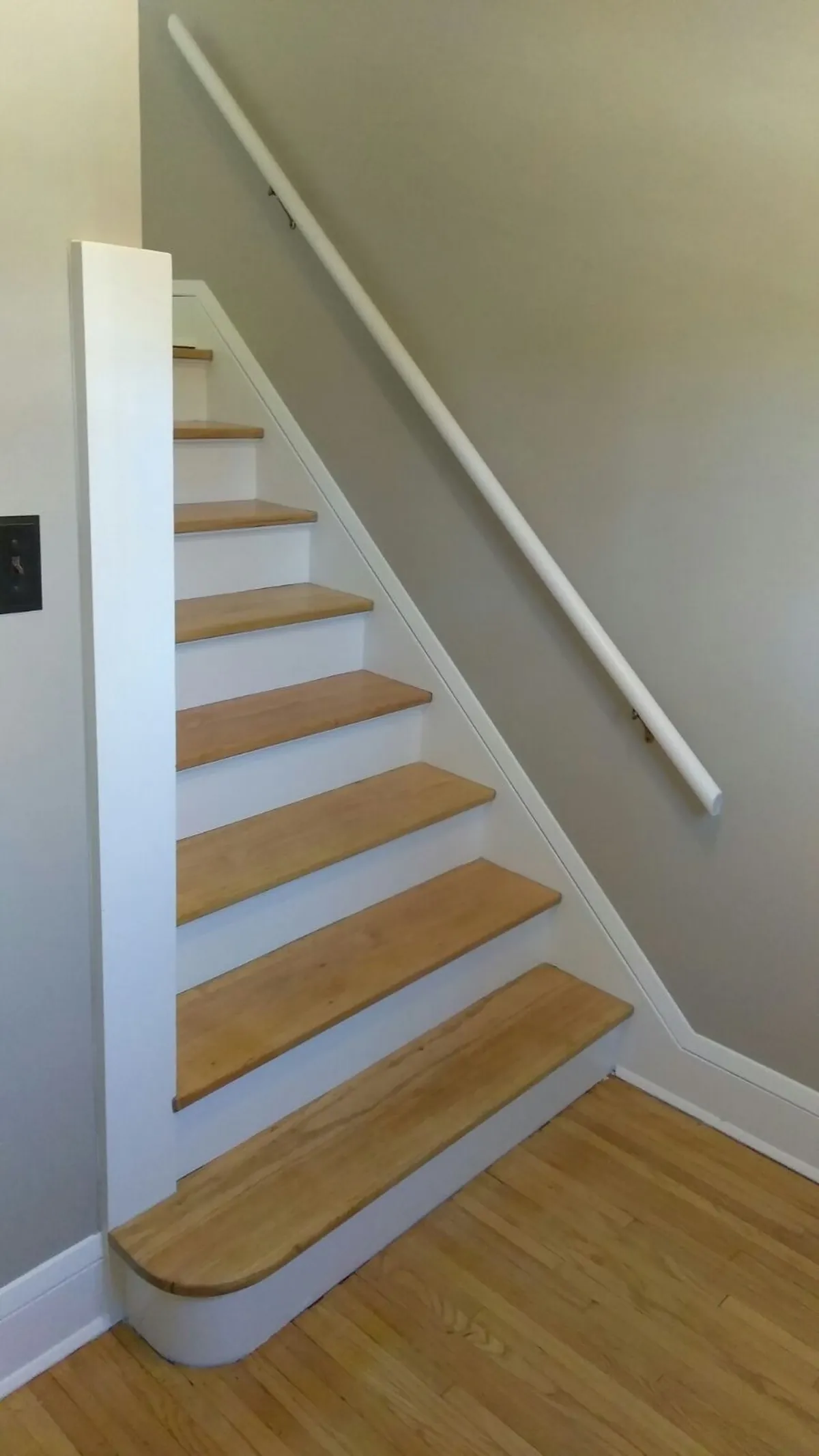 White stair trim and risers finished: Trim enameling · Minneapolis.