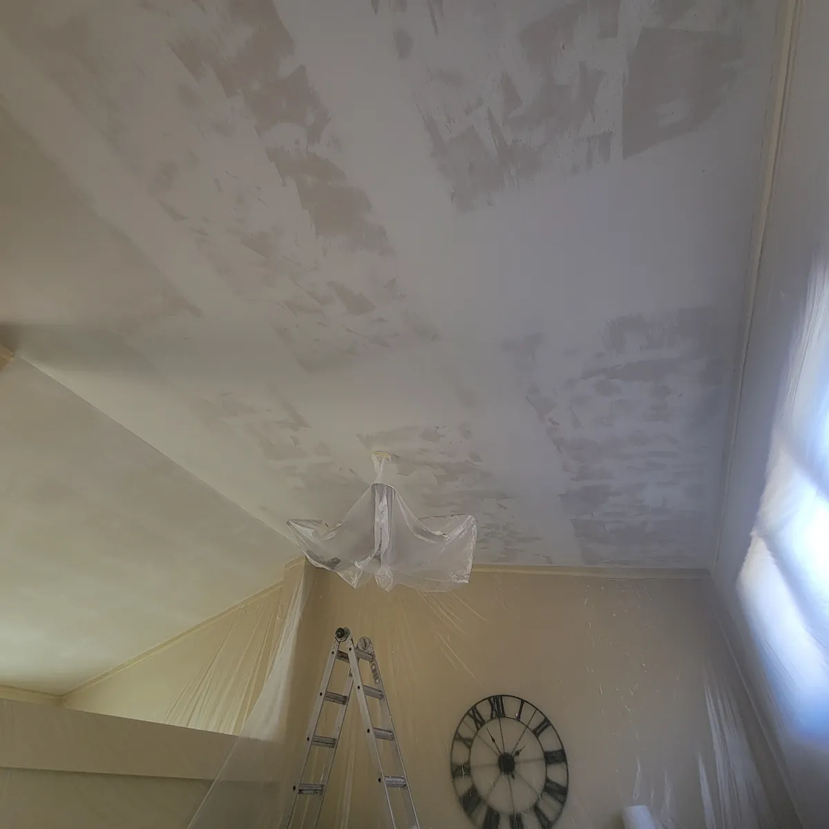 Ceiling preparation in progress: Popcorn texture removal · Eden Prairie.