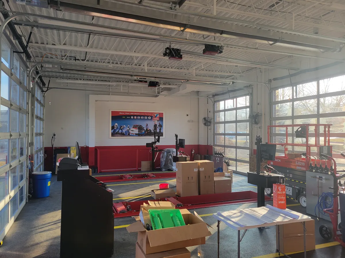 After: painted retail service bay · Edina