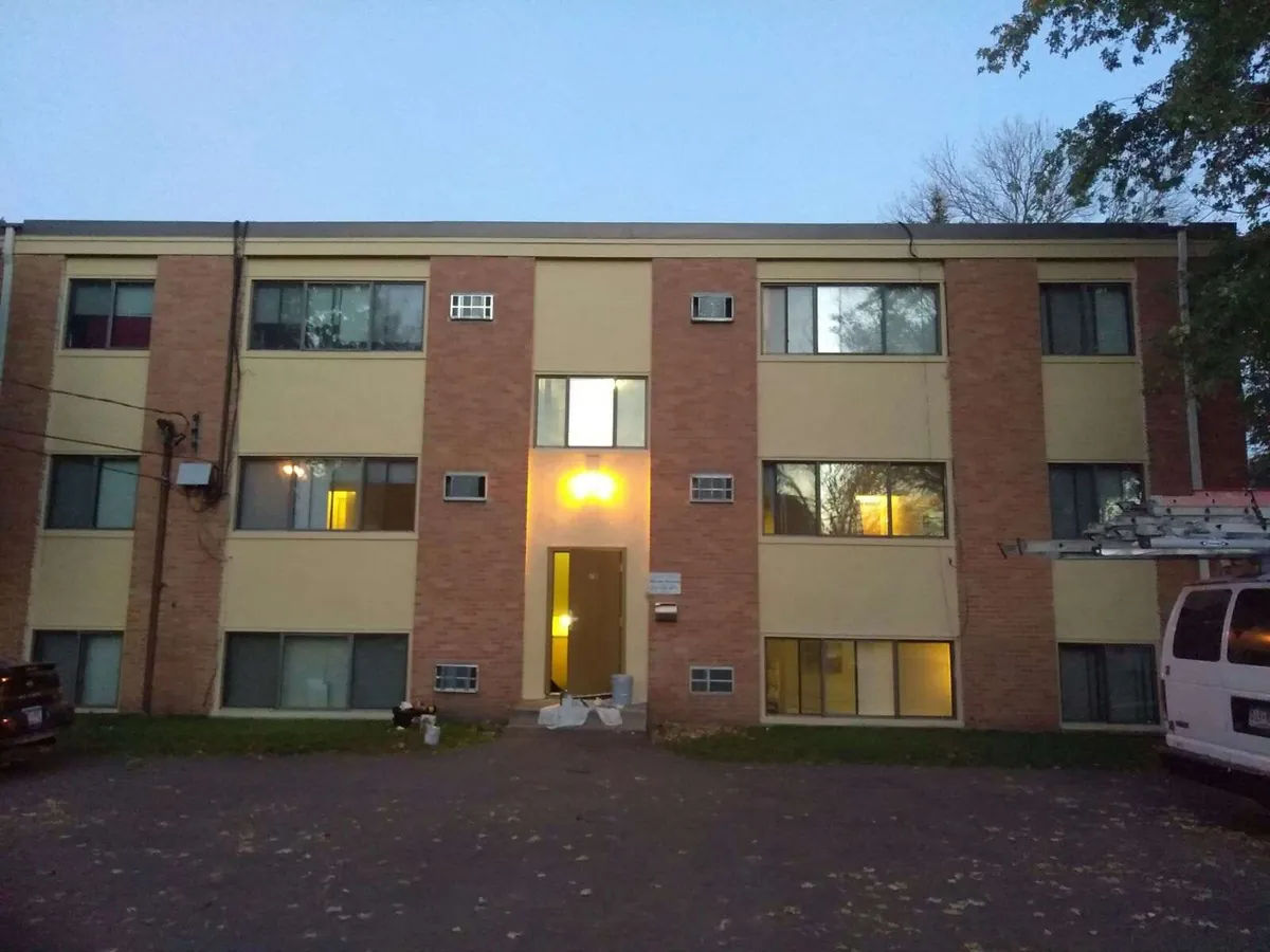 After: apartment building exterior repaint · Minneapolis