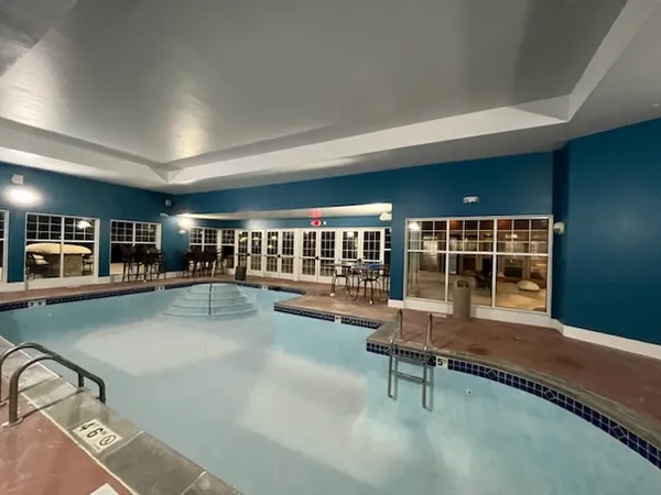 After: indoor pool room, second view · Woodbury